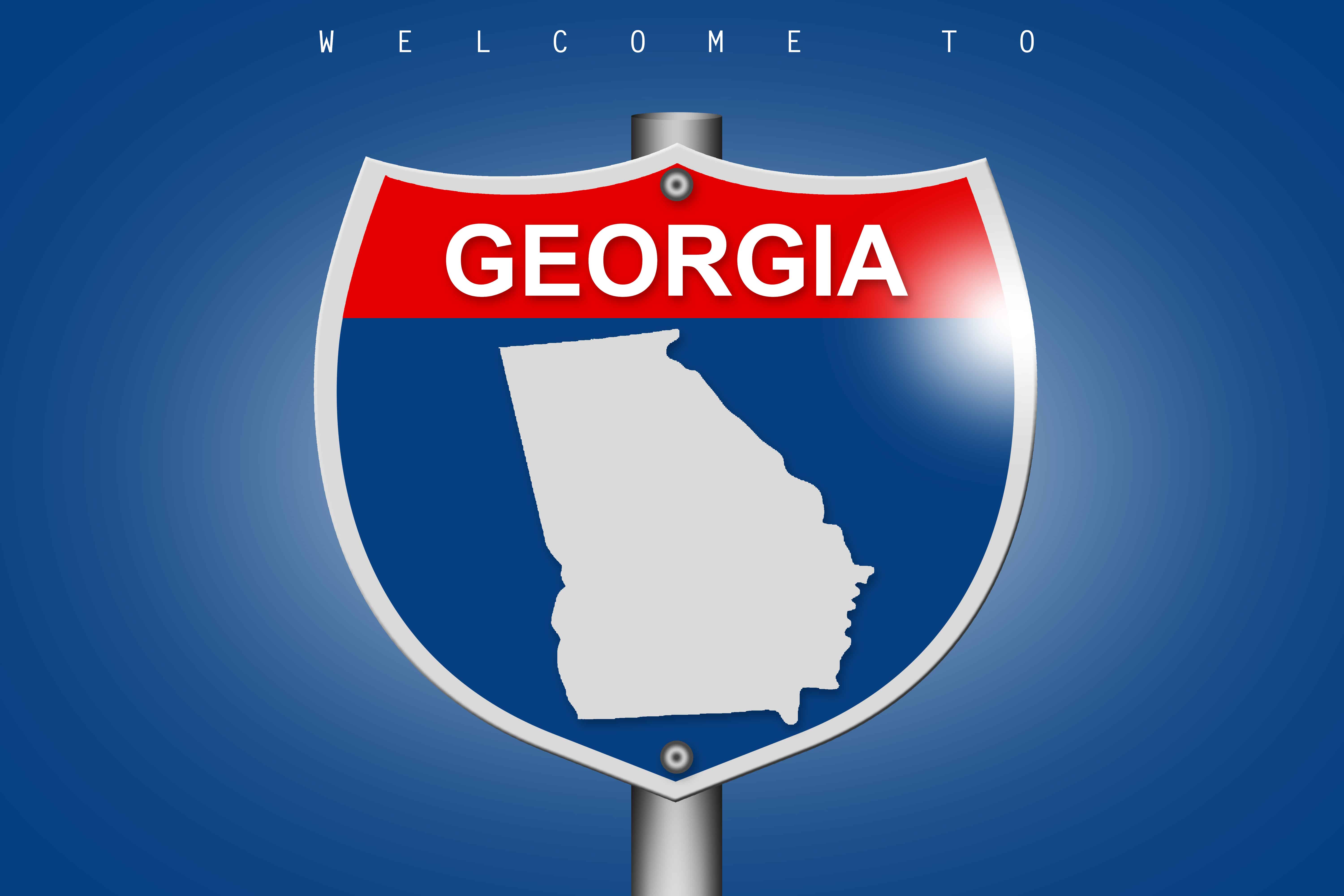 A road sign with the state of georgia on it.