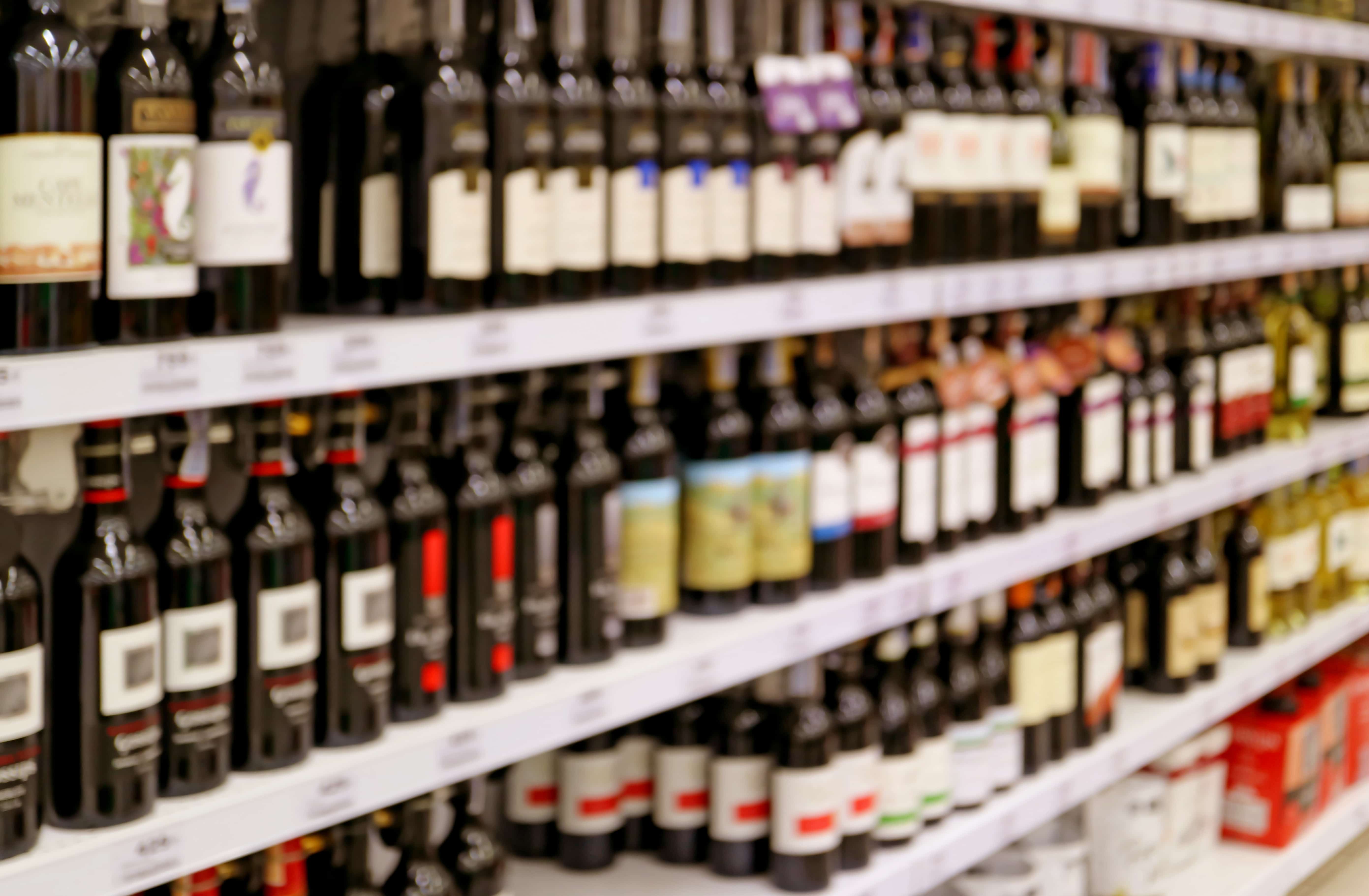 A store with many bottles of alcohol on the shelves.