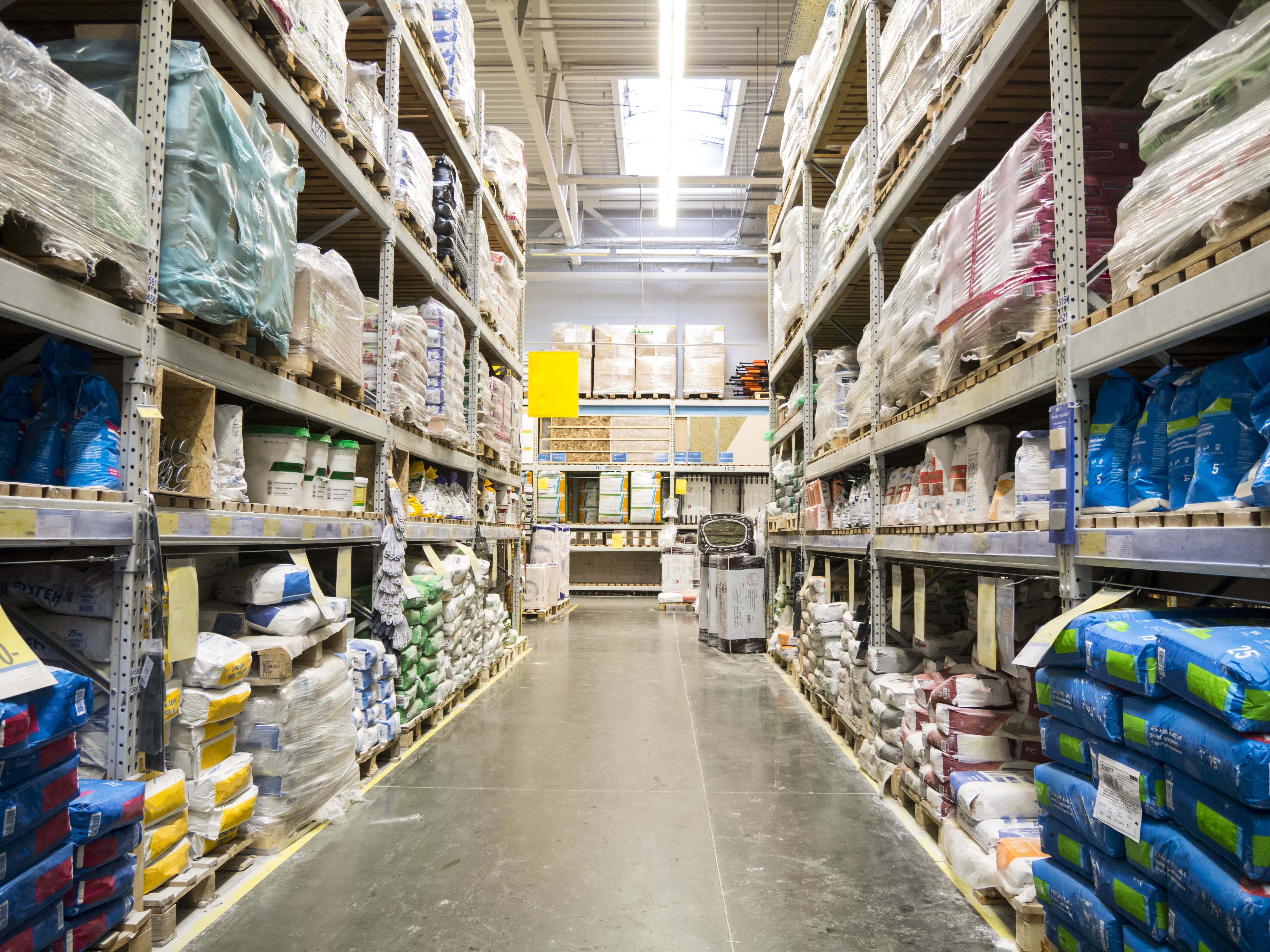 A warehouse filled with lots of shelves and many different items.